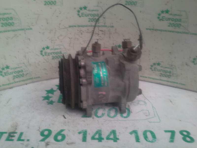 compresor aire acondicionado nissan trade 100 *