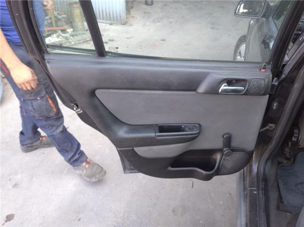 guarnecido puerta trasera izquierda opel astr