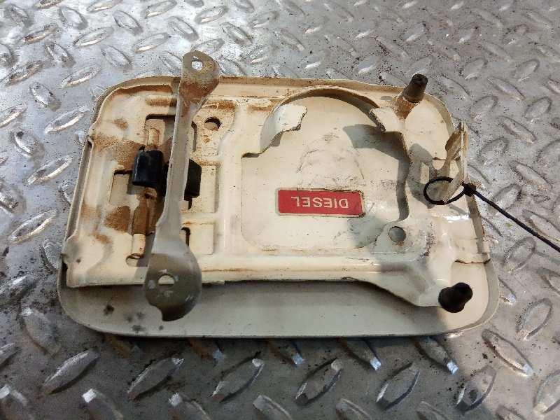 tapa exterior combustible nissan pathfinder (r51) yd25