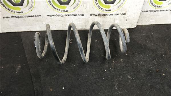 muelle derecho suspension trasera opel combo