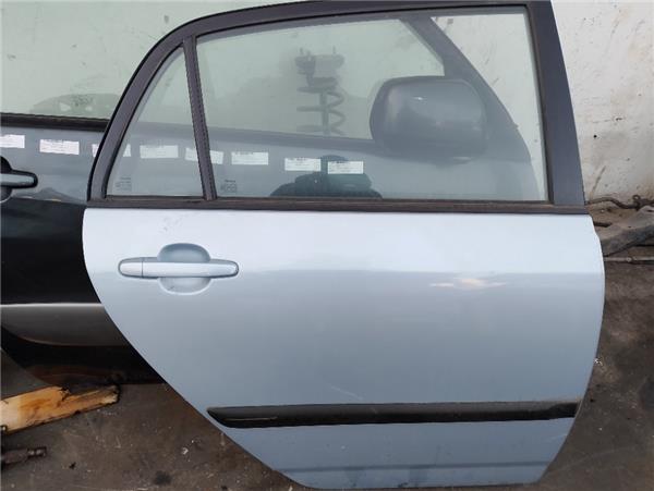 moldura puerta trasera derecha toyota corolla