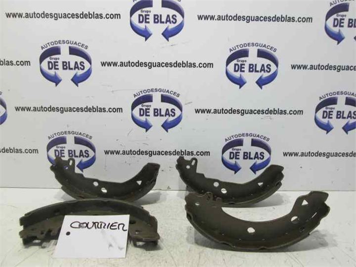 COURIER Zapatas