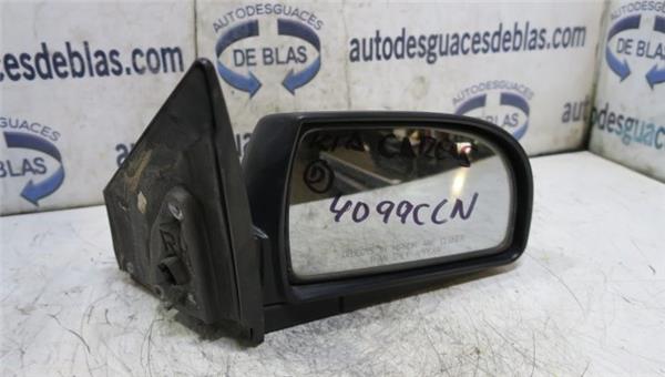 Carens RS2003- Retrovisor Derecho